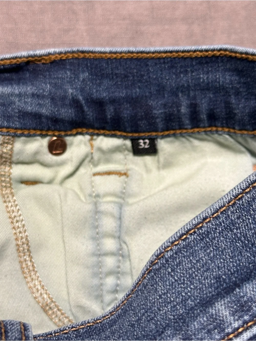 7 For All Mankind Men’s Tapered Jeans in Medium Blue Denim